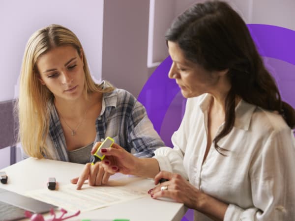 adult dyslexia screening assessment with specialist reviewing written task